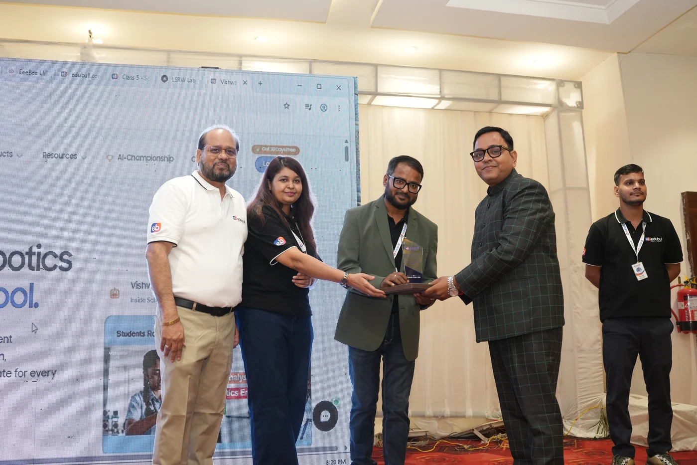 Distinguished school director receiving institutional collaboration recognition