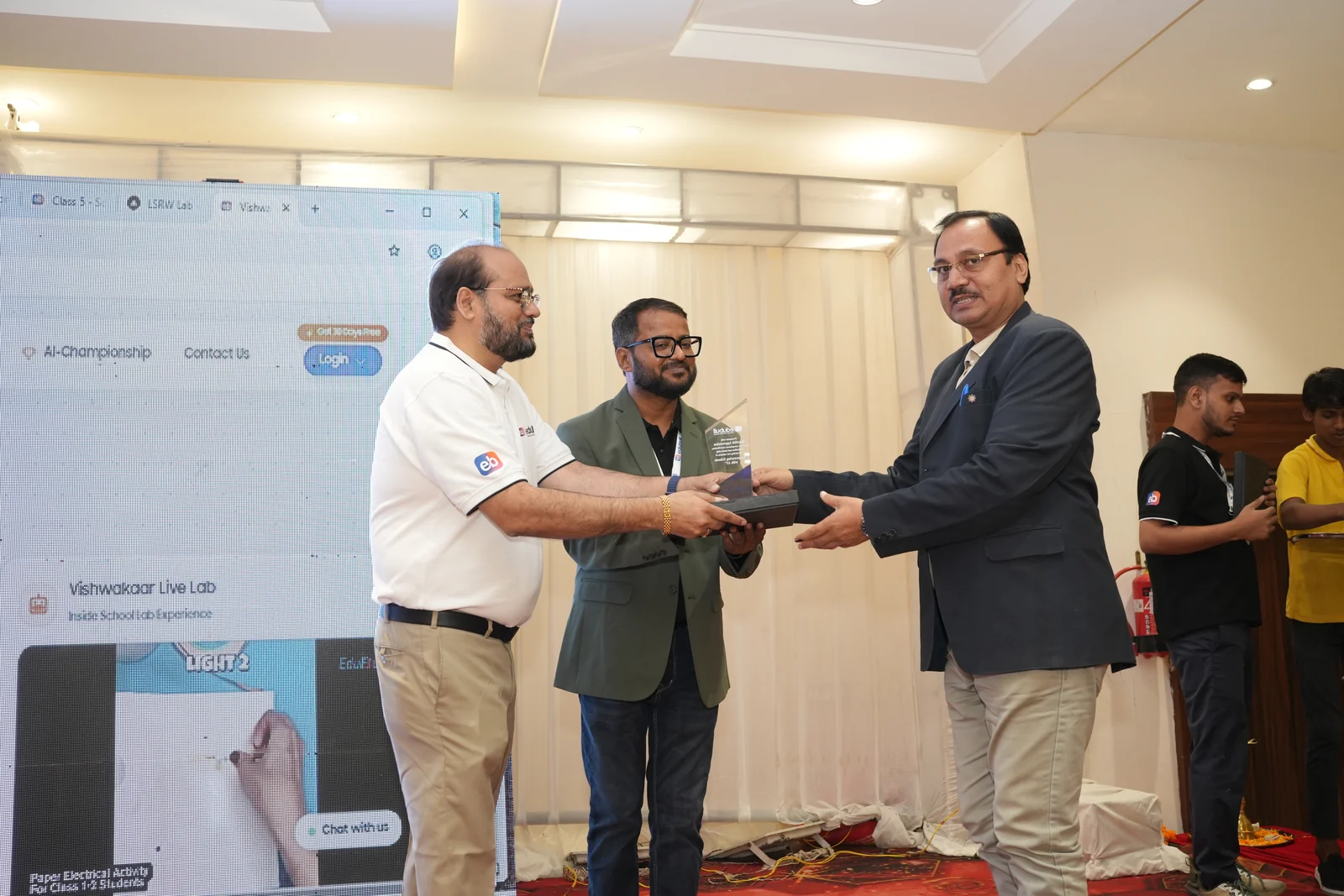 School management representative felicitated with crystal conclave trophy