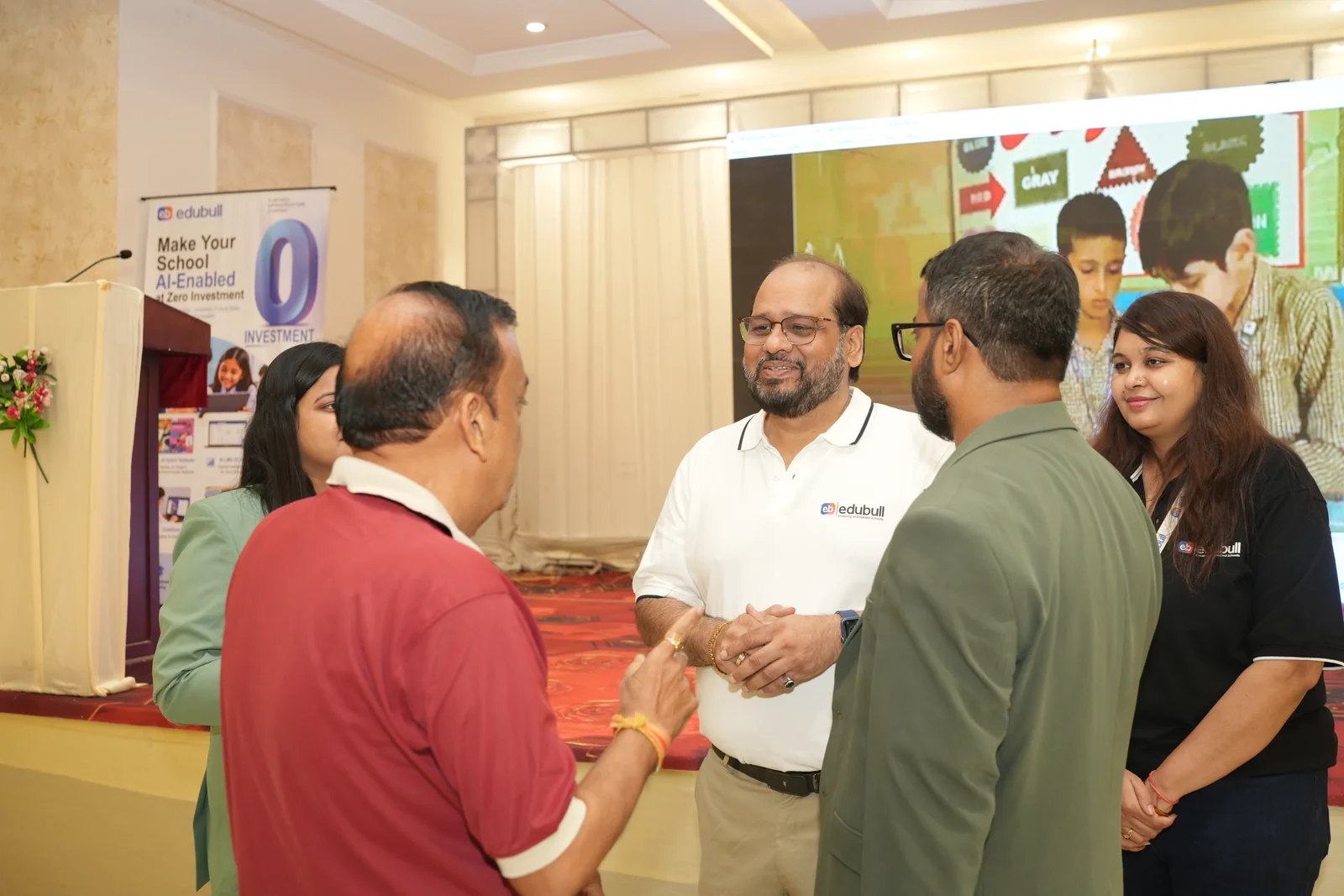 One-on-one leadership consultation with school director discussing curriculum integration